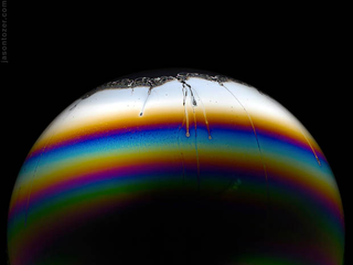 Illustration for article titled Photos of Soap Bubbles that Look Like Trippy Exoplanets